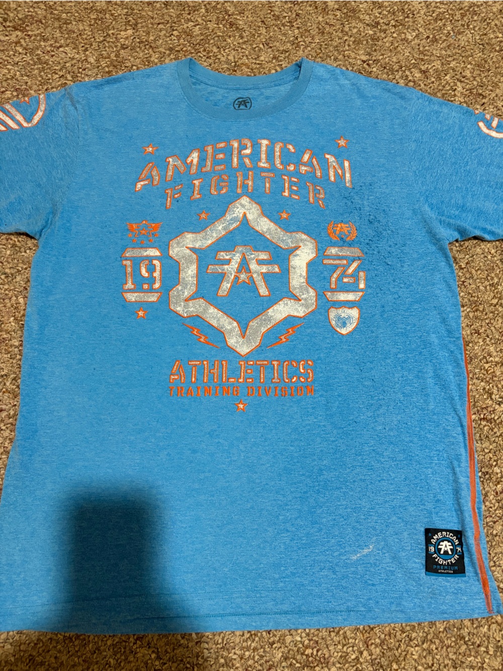 American Fighter Blue Tee with Orange & Silver Graphic